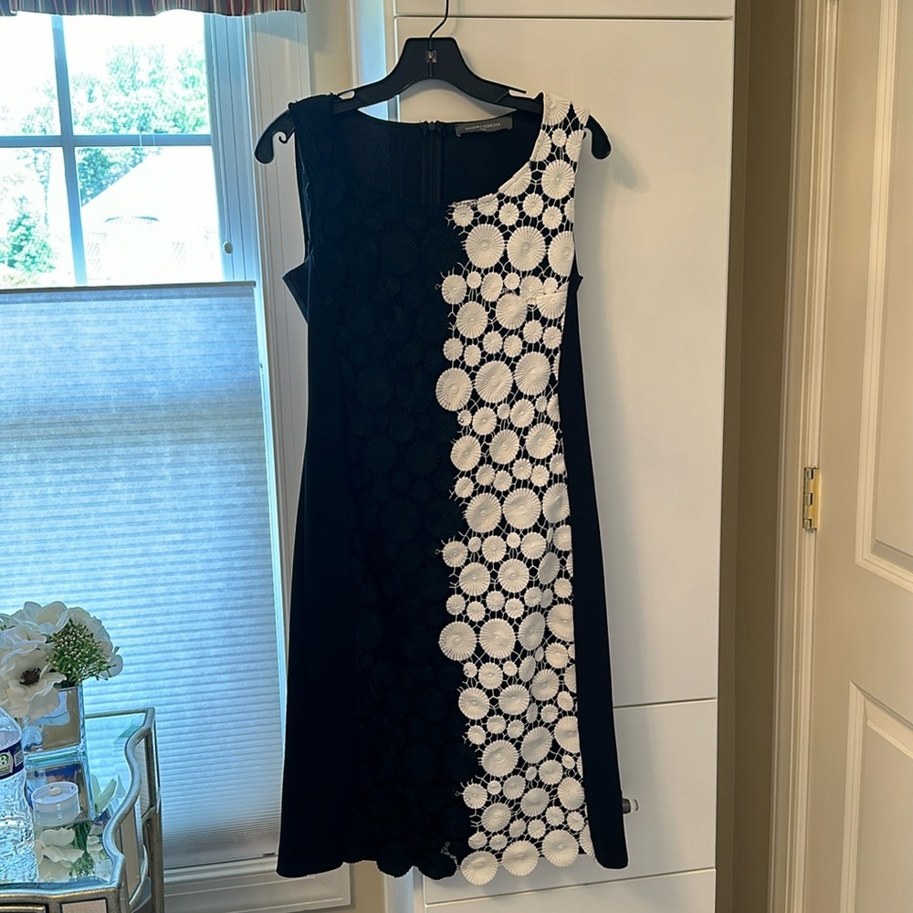 Italian sleeveless dress. Black with black and white lace appliqués.
